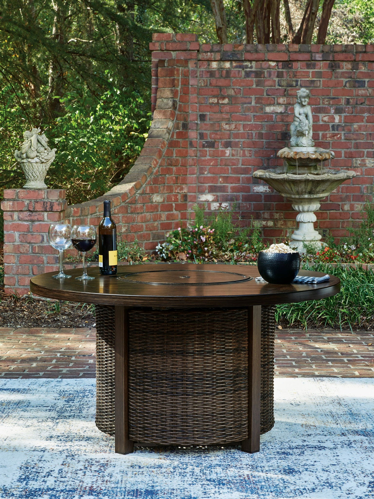 Signature Design by Ashley Monterey Point 48-Inch Round Fire Pit Table